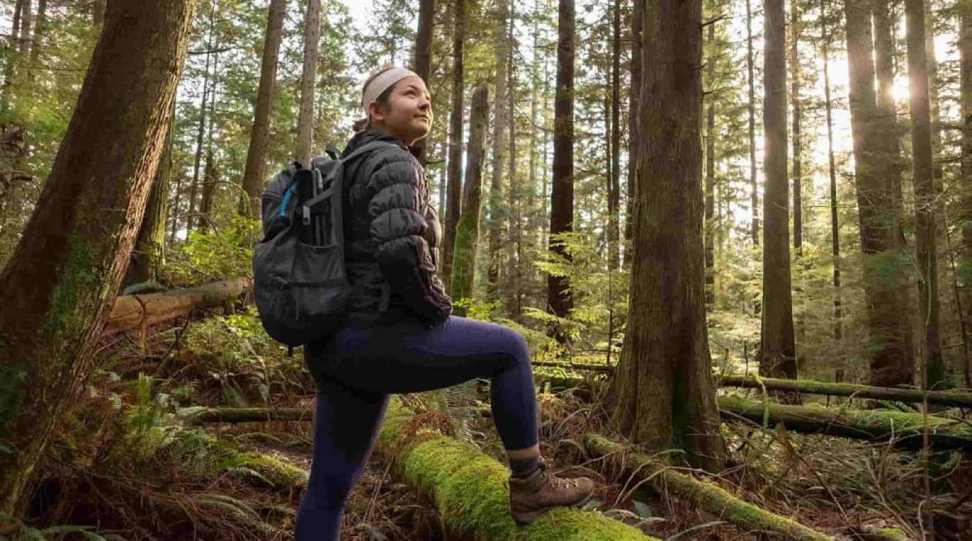 Girl hiking in a forrest